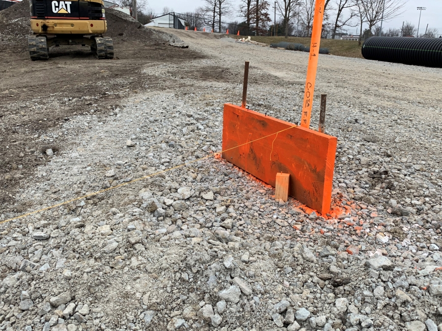 orange board in gravel